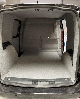 VW Caddy bekleed met stof